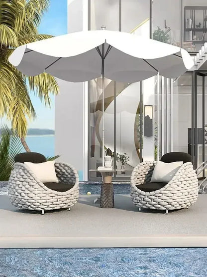 Plush Beige Cushions on Weather-Resistant Rattan Outdoor Seating