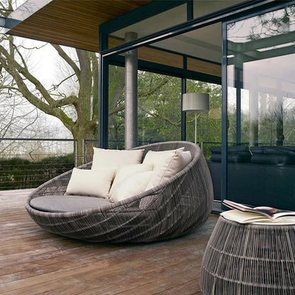 Weather-resistant materials on an outdoor garden round bed chair.