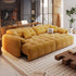 Yellow sofa in a modern living room with decor elements.