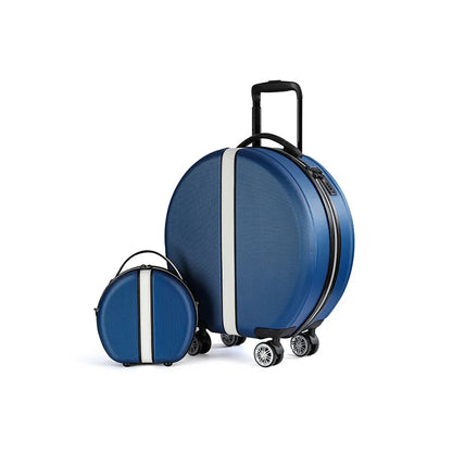 Traveler using rounded cabin trolley luggage at the airport.