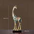 Decorative giraffe statue with measurements on a dark background