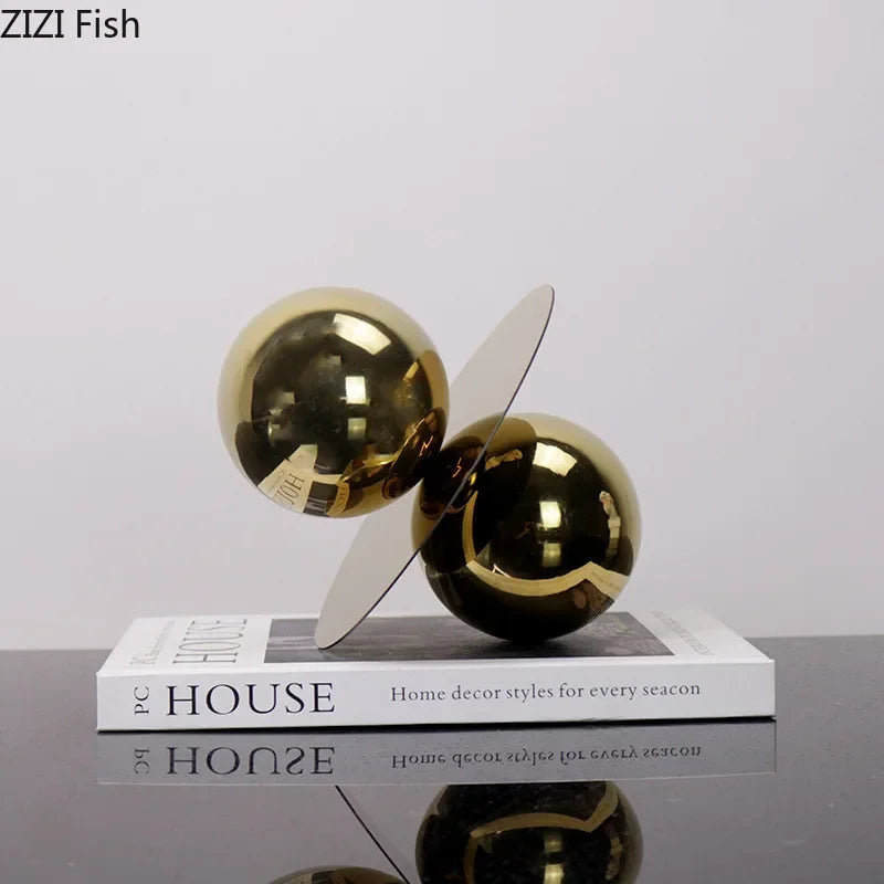 Gold decorative sculpture on a book with &