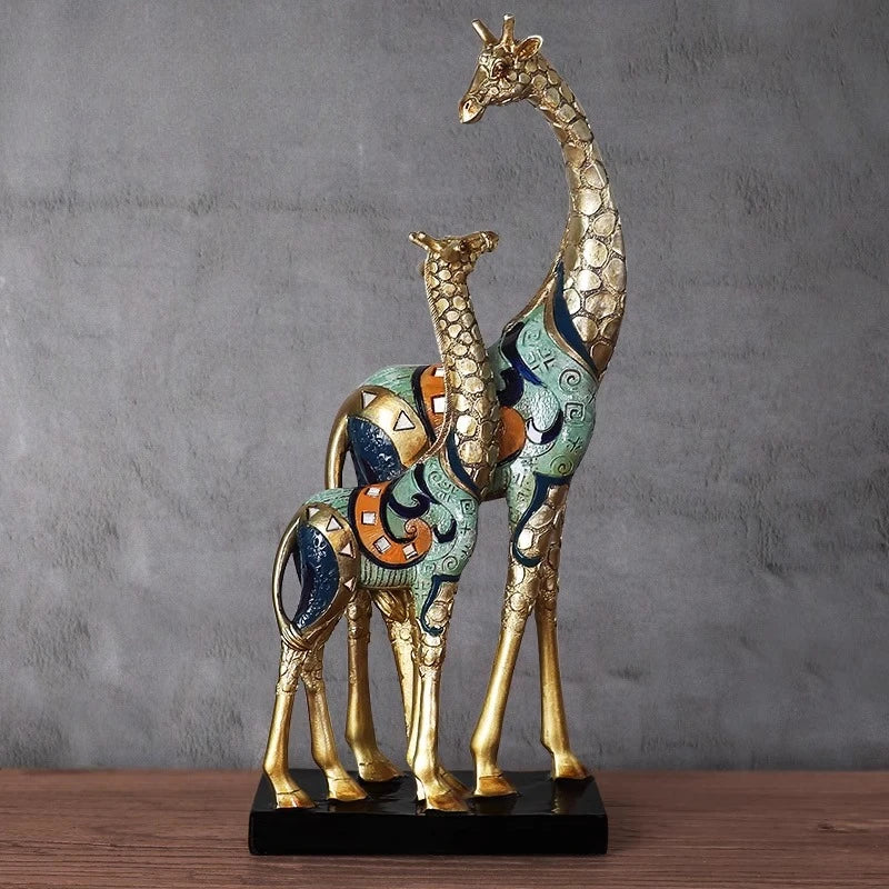 Decorative sculpture of two giraffes with a colorful pattern on a gray background