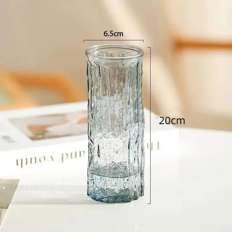 Clear glass vase with dimensions on a blurred background