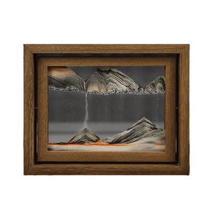 Framed artwork of a mountain landscape with a waterfall
