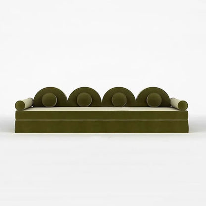 Modern green sofa with circular armrests on a white background