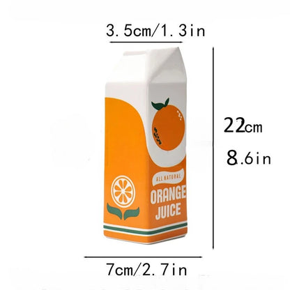 Measurement chart of an orange juice box with dimensions labeled.