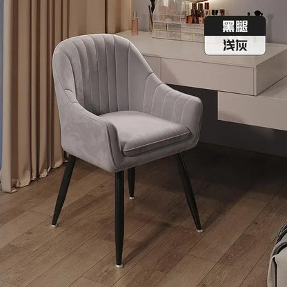 Elegant soft dining chair enhancing UK home decor, floor protected