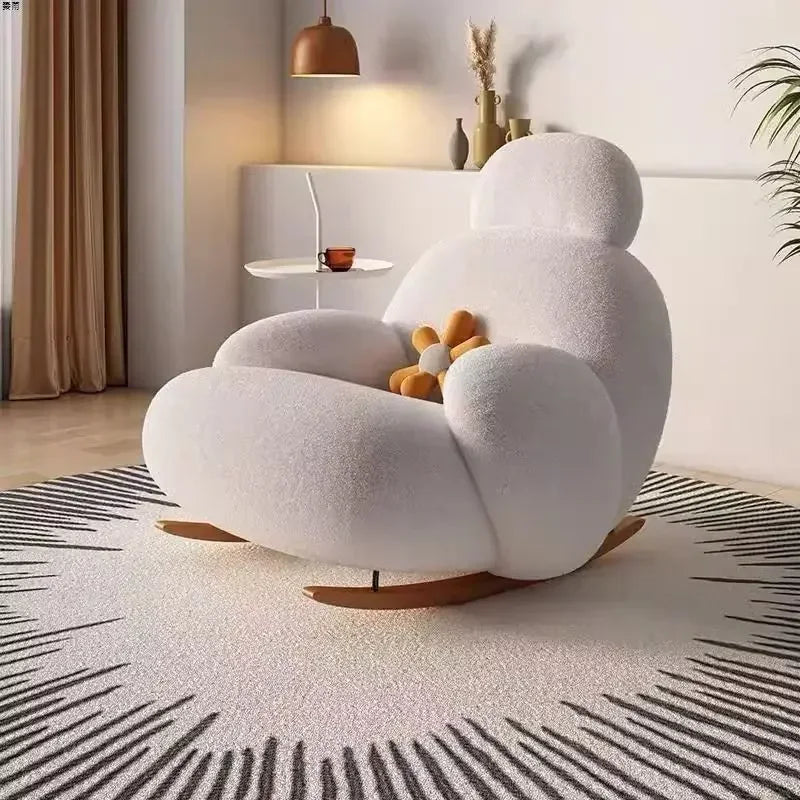 Big white velvet rocking chair perfect for living room relaxation