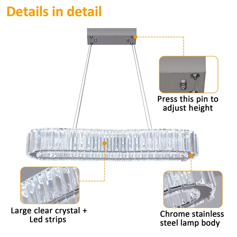 Rectangular crystal LED chandelier in chrome finish, casting sparkling reflections in a dining room setting.