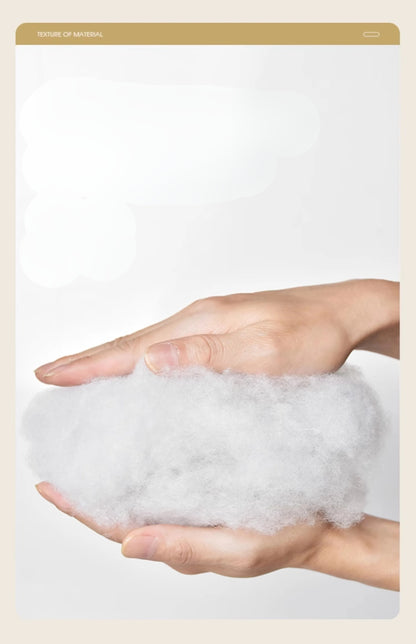 Hand holding a fluffy white cloud against a light background