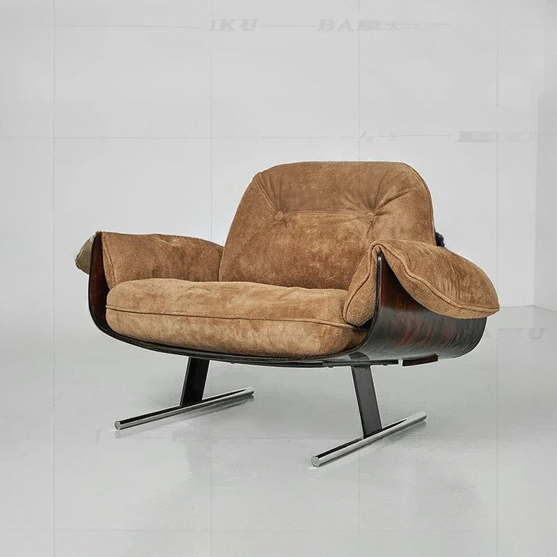 Brown armchair with a metal base on a white background
