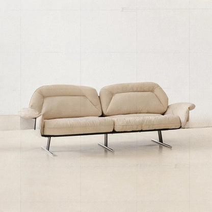 Beige sofa with metal legs on a white background