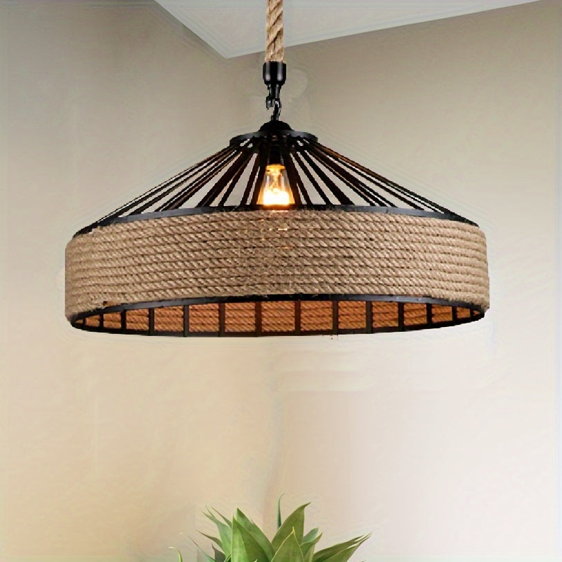 Traditional cast iron chandelier with polished metal and glass shade.