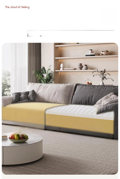 Gray sofa with yellow cushion in a living room setting