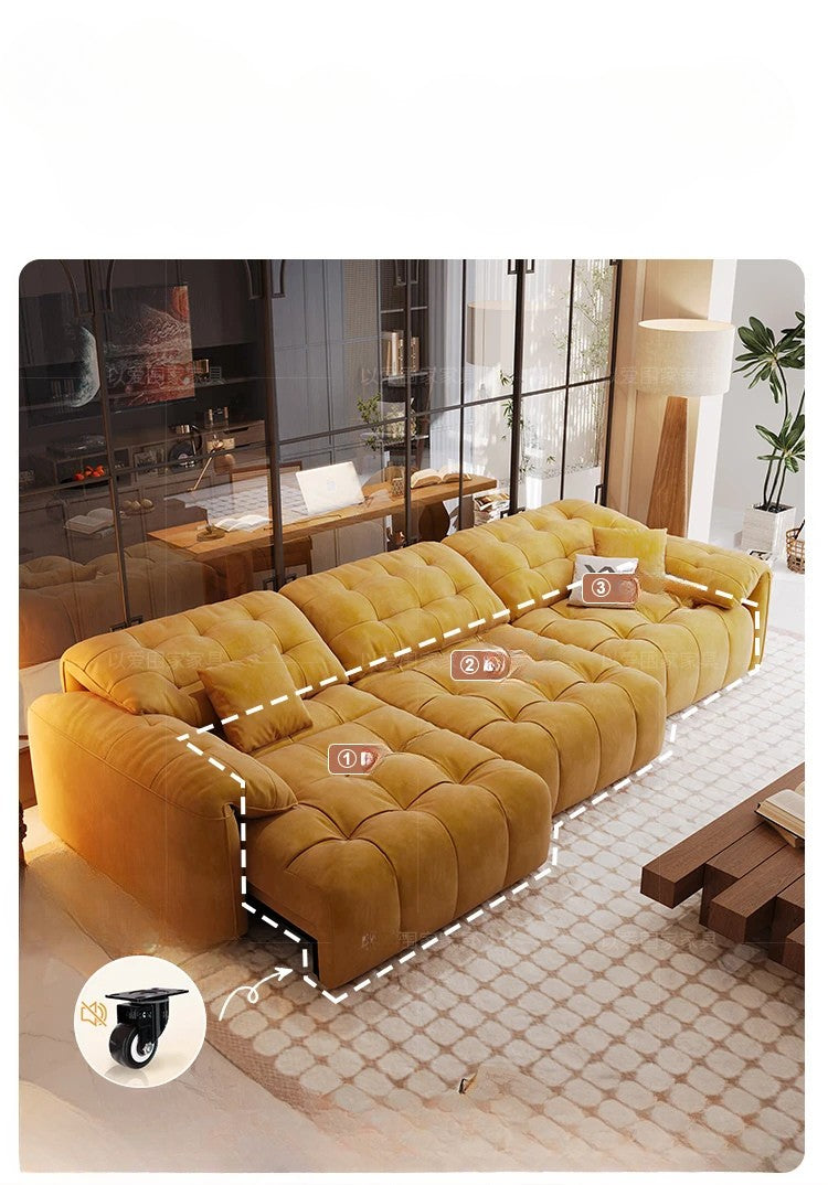 Yellow sectional sofa in a living room setting with measurements indicated.