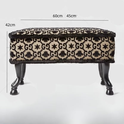 Patterned ottoman with dimensions on a white background
